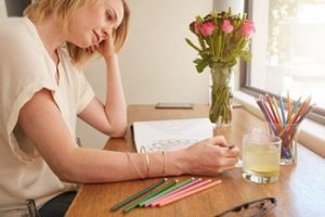 Woman-coloring-in-coloring-book