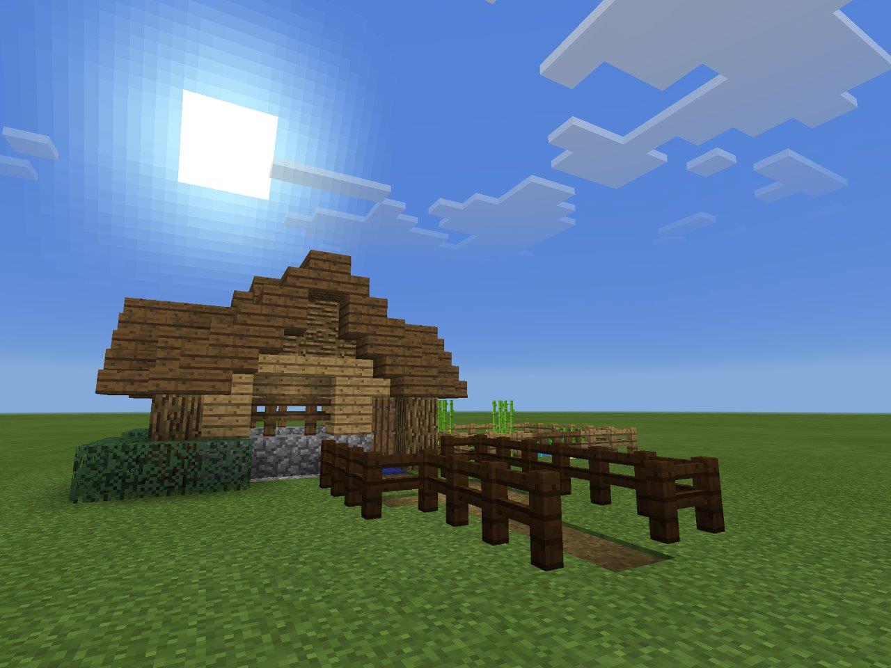 Minecraft log cabin with fence and garden